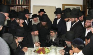 Rav Malkiel Kotler, Rosh Yeshivah of Beth Medrash Govoha of Lakewood, with the Rebbe. Standing between them is the Rebbe's gabbai, Reb Chaim Shlomo Fisher