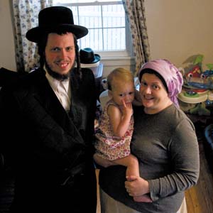 Rabbi Joseph Kolakowski, his wife Chavah and their daughter Faith. Photo by Scott Elmquist