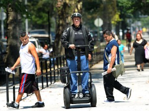 Jonathan Gleich draws curious stares from onlookers while on Segway. photo credit NY Daily News