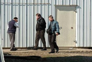 Government representatives, one of whom said he was from the United States Department of Agricultures compliance unit were at 6260 Kinsman Road in Kinsman on Monday after a reported FBI raid on a meat processing facility.  (Liz Wilkinson Allen/Staff Photographer)