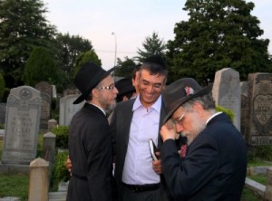Diamond Mogul Morris Gad, a philanthropist that has donated millions to Jewish org will give to Haiti in this File photo Oct. 17 2009 Gad (c) is at the Ohel of The Lubavitcher Rabbi Zt'l with (R)NCFJE Chairman Rabbi Shea Hecht and Shimon Hecht Photo: Menachem Kozlovsky