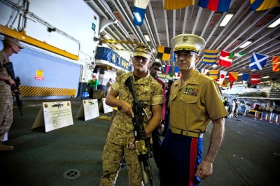 Lt. Col. Dave Rosner, right, onboard the USS Iwo Jima. The officer is also a stand-up comedian who has performed at clubs such as Catch a Rising Star.[Julie Platner for The Wall Street Journal]