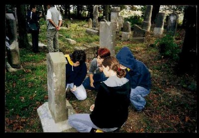 Photo illustration of teens cleaning polish Jewish cemetery