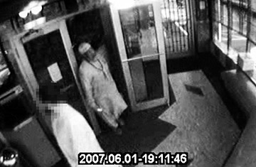 FILE - Video frame grabs of Russell Defreitas, in a traditional Muslim outfit and skullcap, caught on the surveillance tape of the Lindenwood Diner with an FBI informant, face pixelated, Monday, June 4, 2007. Defreitas is one of four men arrested in the JFK Airport terror plot. Charles Eckert / Polaris