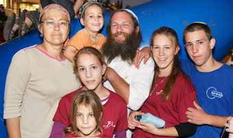 Talya and Yitzhak Imes with their six children who were left without parents