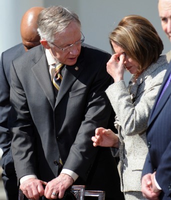 US Senate Majority Leader Harry Reed talks with Speaker of the House Nancy Pelosi  EPA/SHAWN THEW