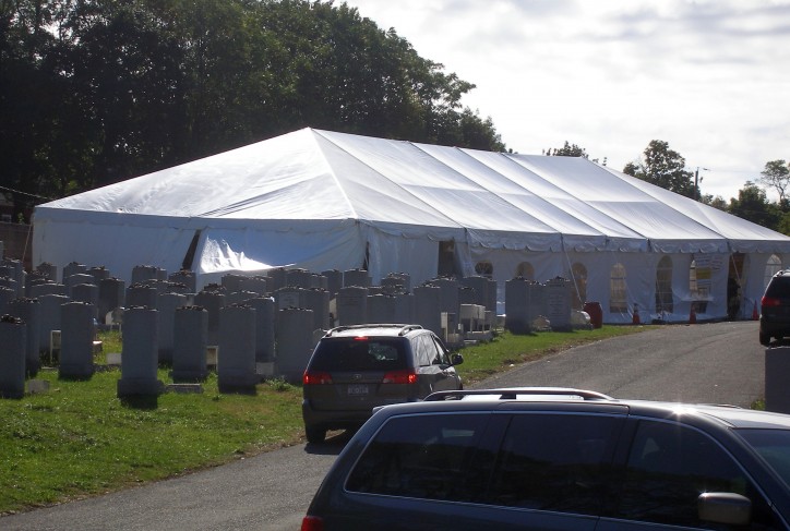 A large tent erected up seen early this morning where thousands decent to daven near the Kever Photo: Sandy Eller