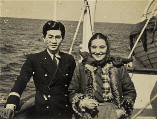 This undated photo found in a diary owned by Japanese tourism official Tatsuo Osako and released on July 26, 2010 by Akira Kitade who worked under Osako, shows Osako with a woman on a ship. The photo is part of a recently discovered group of prints which throws more light on a subplot of the Holocaust: the small army of Japanese bureaucrats who helped shepherd thousands of Jews to safety. (AP Photo/Tatsuo Osako) 