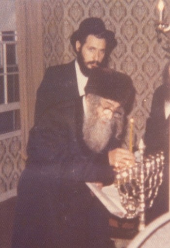 During Chanukah in Los Angels in 1975 seen in background Singer Mordchai Ben David who was many years the Gabi for the Rebbe
