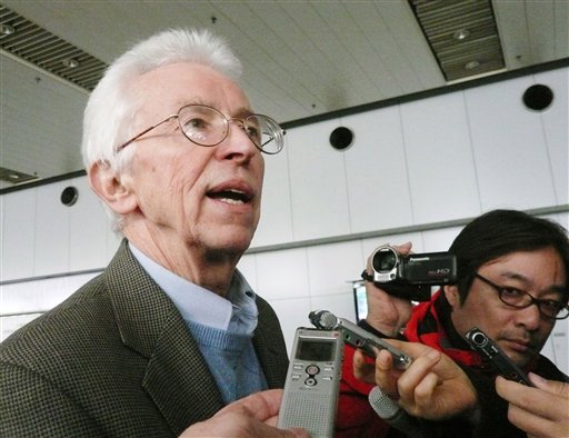 In this Nov. 13, 2010, photo, American nuclear scientist Siegfried Hecker, left, speaks to media upon returning from North Korea, at Beijing international airport in Beijing, China. North Korea has secretly and quickly built a new facility to enrich uranium, according to the American scientist, raising fears that the North is ramping up its nuclear program despite international pressure. (AP Photo/Kyodo News)