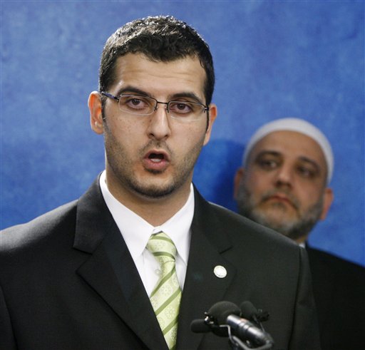 Muneer Awad, executive director of the Council on American-Islamic Relations - Oklahoma Chapter, left, answers questions during a news conference in Oklahoma City, Thursday, Nov. 4, 2010. 