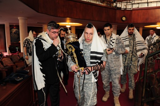 US Army Chaplain Boaz Vituk brings Torah  back to Aron Kodesh on Thursday  morning Feb 17 in the Shul of Bal  Harbour