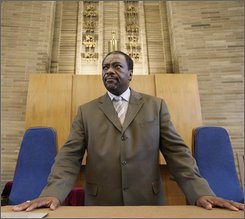 AP File - Rabbi Capers C. Funnye Jr., of the Beth Shalom B'nai Zaken Ethiopian Hebrew Congregation stands in the sanctuary of the synagogue
