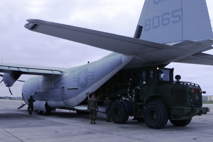  A handout picture provided by U.S. Marine Corps on 13 March 2011 shows Marines from III Marine Expeditionary Force as they load supplies and equipment onto a KC-130J Super Hercules aircraft at Marine Corps Air Station Futenma, in Okinawa, Japan, 13 March 2011. The supplies will be delivered to mainland Japan to be used in humanitarian assistance operations following the earthquake and tsunami that struck northern Japan, March 11. The proximity of Marine Corps aviation assets at MCAS Futenma has allowed Marines from III MEF to rapidly deploy critically-needed supplies and aid to support the relief effort.  EPA/CPL.