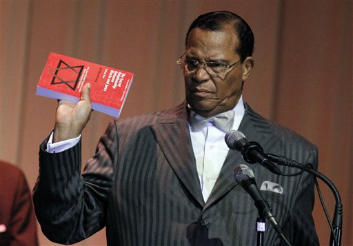 Minister Louis Farrakhan displays the book, "The Secret Relationship Between Blacks and Jews," during his speech Friday, March 25, 2011 at Jackson State University in Jackson, Miss., as part of the 6th Annual Conference of the Veterans of the Mississippi Civil Rights Movement. Farrakhan, who leads the Chicago-based Nation of Islam delivered a speech on the need of a new grassroots movement for a change in education, and believes the book, which alleges Jews promoted a myth of black racial inferiority and accuses Jews with extensive involvement in the slave trade and in the cotton, textiles, and banking industries should be taught in schools. (AP Photo/Rogelio V. Solis)