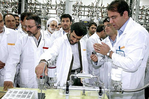 Iranian President Mahmoud Ahmadinejad (c.) visits the Natanz nuclear facility, south of Tehran, in this April 8, 2008, file photo.