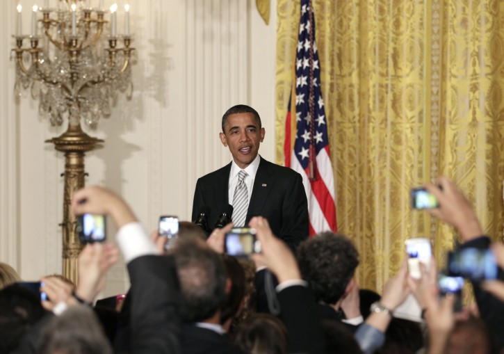 Members of the audience hold up cells phones and cameras as President Barack Obama speaks during a reception in honor of Jewish American Heritage Month at the White House, Tuesday, May 17, 2011, in Washington.  (AP Photo/Carolyn Kaster)