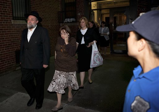 Family of 8-year-old Leiby Kletzky leave for funeral services in the Brooklyn borough of New York Wednesday, July 13, 2011. AP
