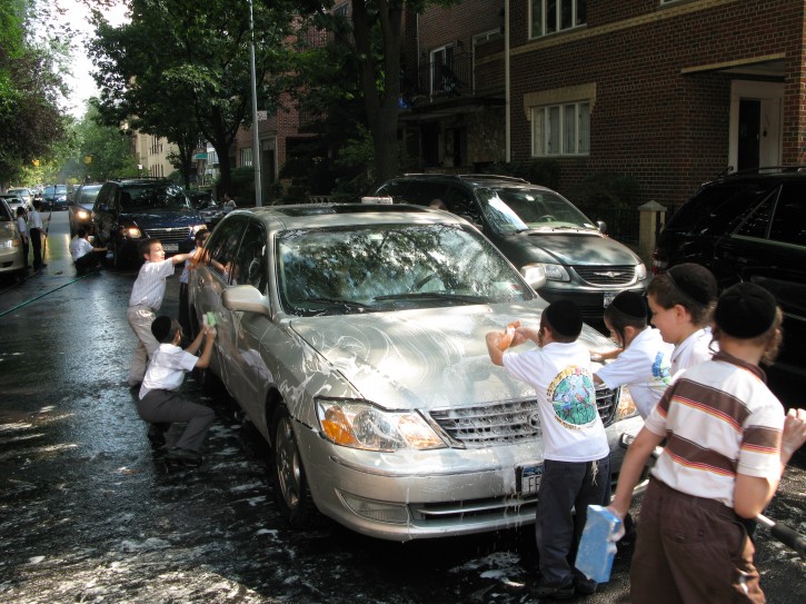 he Sanz Klausenberg Day Camp, located on 50th Street between 13th and 14th Avenue, arranged a full service car wash. Credit: Dee Voch 