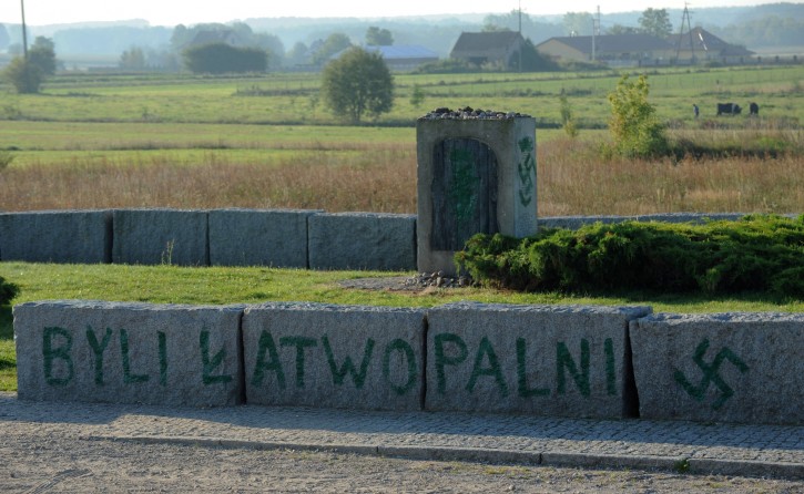 An inscription reading "They were Flammable" and a Nazi swastika are seen in Jedwabne, Poland, Thursday, Sept. 1, 2011, on the monument dedicated to Jews from the town of Jedwabne burned to death by their Polish neighbors in 1941. (AP Photo/Michal Kosc)