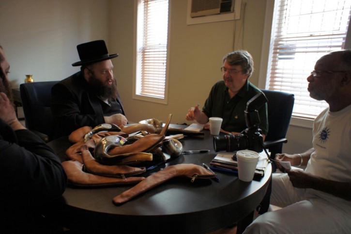 NY times reporters Talking to Rabbi Meisner. Photo Alex Rappoprt