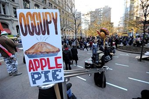 Occupy Wall Street protesters eat donated Thanksgiving dinners in Zuccotti Park on November 24, 2011 in New York. EPA