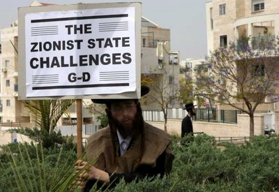 FILE - An anti-Zionist, ultra Orthodox Jewish man from the Neturei Karta sect of Hassidic Jews, dressed in a burlap sack, stands in the bushes during a demonstration in Bet Shemesh, Israel, 20 April 2010 EPA