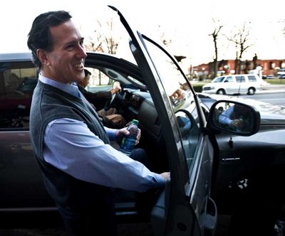  Republican presidential candidate and former Pennsylvania Senator Rick Santorum smiles as he gets in his campaign vehicle following a campaign event at the Smokey Row Coffeehouse in Oskaloosa, Iowa, USA 31 December 2011. Santorum has advanced in the polls and is running on the heels of leaders Mitt Romney and Ron Paul as the date of 03 January 2012  Iowa Caucus approaches.  EPA/TANNEN MAURY