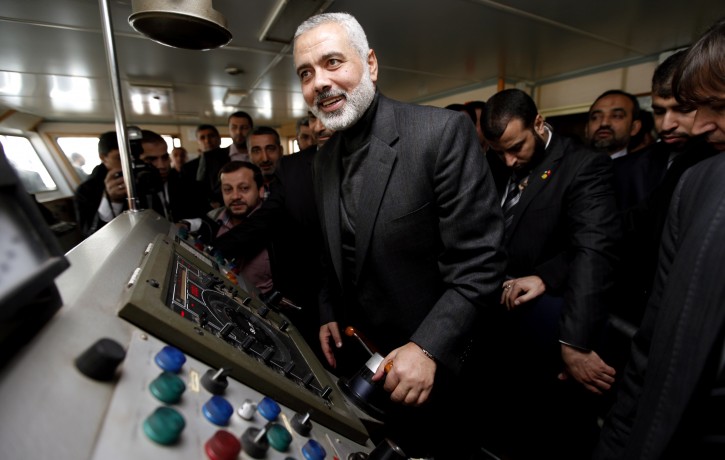  Hamas leader Ismail Haniyeh (L) poses at wheelhouse of the cruise liner Mavi Marmara during his visit in Istanbul, Turkey 02 January 2012. According to media sources, Haniyeh started on 25 December 2011 a tour of several Muslim countries, his first since his militant Islamist movement seized control of the coastal enclave in June 2007. Haniyeh will visit Egypt, Sudan, Tunisia, Bahrain, and Turkey, his aide Yousef Rizqah said in a statement. The reported aim is to garner support for the Palestinians and for Gaza Strip.  EPA/TOLGA BOZOGLU