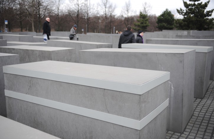  A metal brace runs around one of the concrete pillars of the 'Memorial to the Murdered Jews of Europe' in Berlin,?Germany, 14 March 2012. Cracks have been found again on the concrete pillars. The memorial with 2,711 concrete blocks was opened on 10 May 2005.  EPA/RAINER?JENSEN