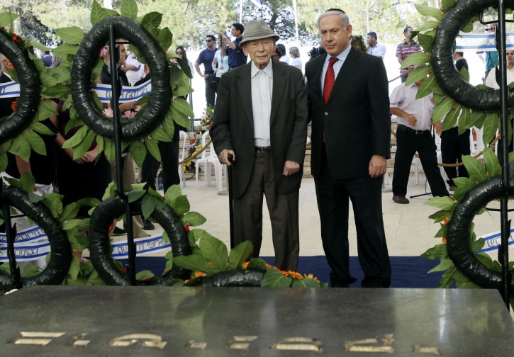 FILE - In this July 11, 2010 file photo  Israeli Prime Minister Benjamin Netanyahu and his father Benzion attend the official memorial service for the late Zionist leader Ze'ev Jabotinsky at the Mt. Herzl cemetery in Jerusalem. Benzion Netanyahu died Monday, April 30, 2012 at the age of 102. (AP Photo/Kobi Gideon, Pool, Files)