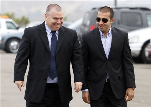 FILE - (L)former Israeli Shin-Bet agent Gonen ben Itzhak with (R) Mosab Hassan Yousef 