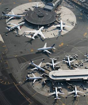 Planes parked at terminals in Newark's Liberty International Airport. (Mark Lennihan  /  AP)