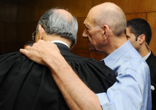 Former prime minister and Jerusalem mayor Ehud Olmert with his attorney at the Tel aviv distrcit court. The trial of former Prime Minister Ehud Olmert on his involvement in the Holyland Project affair Began today, Sunday 1 2012. 