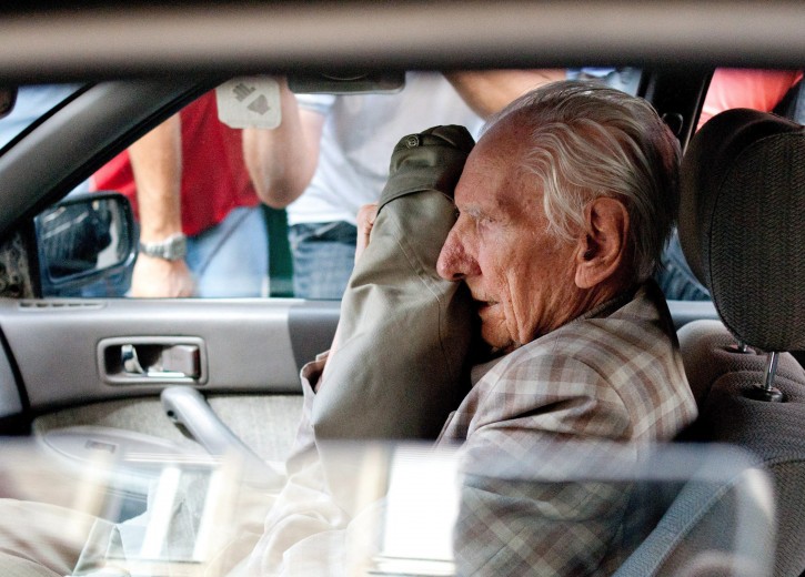 Alleged Hungarian war criminal Laszlo Csatary sits in a car as he leaves the Budapest Prosecutor's Office after he was questioned by detectives on charges of war crimes during WWII and prosecutors ordered his house arrest in Budapest, Hungary, 18 July 2012. Csatary is accused of being a war criminal by the Jerusalem affiliate of the Vienna based Simon Wiesenthal Centre. The centre says Csatary as a senior officer of the Hungarian gendarmerie of the then Hungarian town of Kassa, today Kosice, Slovakia, is responsible for the murdering of 15,700 Jewish Hungarians by organising their deportations to the Nazi death camp of Auschwitz in 1944.  According to the prosecutor's office Csatary denied the charges.  EPA/BEA KALLOS