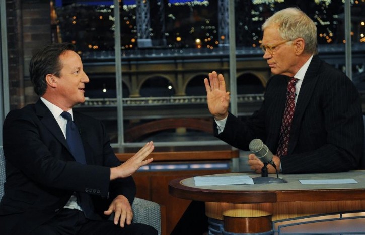 Britain's Prime Minister David Cameron (left) talks with talk show host David Letterman on the David Letterman Show. (AP Photo / Stefan Rousseau/PA) 