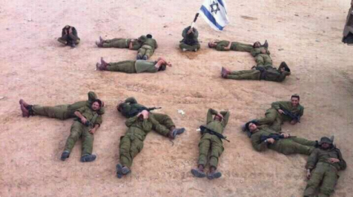 Soldiers use their bodies to spell in Hebrew' Bibi [is a] loser' Thursday (photo credit: screen capture/Facebook)