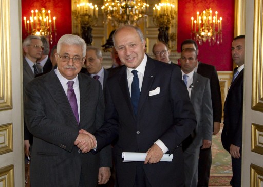 FILE - French Foreign Affairs Minister Laurent Fabius (R) shakes hands with Palestinian Authority President Mahmoud Abbas (L) as they meet at the Quai d'Orsay in Paris, 07 June 2012.  EPA