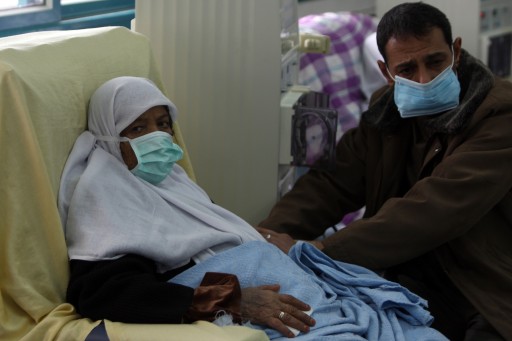 File Photo of Palestinian doctors wear protective masks due to cases of flu outbreak. Photo by Wissam Nassar/FLASH90