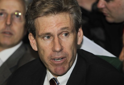 File photo of then U.S. envoy Chris Stevens attends meetings at the Tibesty Hotel where an African Union delegation was meeting with opposition leaders in Benghazi, Libya. (AP Photo/Ben Curtis, File)