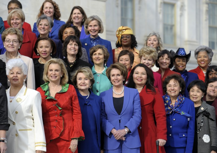 House Minority Leader Nancy Pelosi of Calif., front row, center, poses with other female House members on the steps of the House on Capitol Hill in Washington, Thursday, Jan. 3, 2013, prior to the official opening of the 113th Congress . (AP Photo/Cliff Owen)