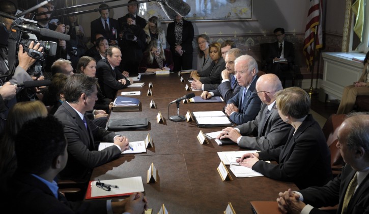 Vice President Joe Biden, fourth from right, with Attorney General Eric Holder at his left, speaks during a meeting with victim's groups and gun safety organizations in the Eisenhower Executive Office Building on the White House complex in Washington, Wednesday, Jan. 9, 2013. Biden is holding a series of meetings this week as part of the effort he is leading to develop policy proposals in response to the Newtown, Conn., school shooting (AP Photo/Susan Walsh)