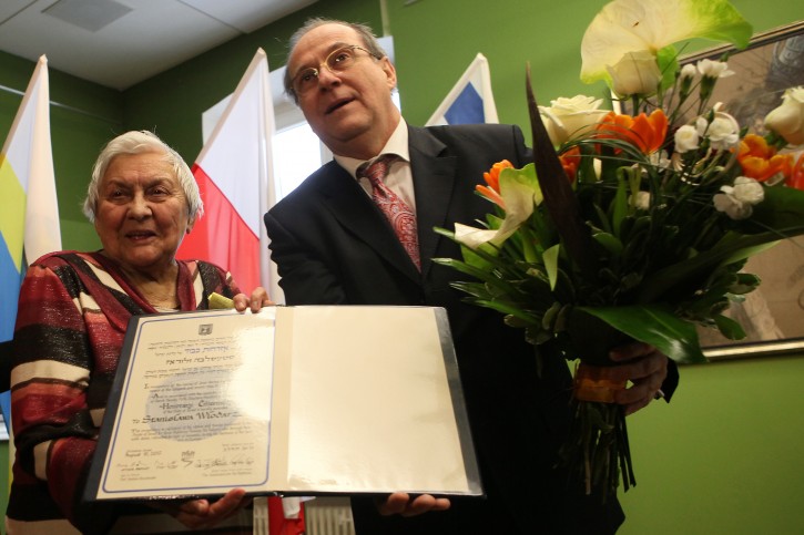 Ambassador of Israel to Poland Zvi Rav-Ner (R) and Stanislawa Wlodarz (L) during the ceremony of granting the Honorary Citizenship of Israel to Mrs. Wlodarz, the Righteous Among the Nations, in Czestochowa, Poland, 29 January 2013. During the Second World War Stanislawa Wlodarz and her parents lived in a village of Cykarzew, near Czestochowa. Risking their lives for two years they were hiding and taking care of Mosze Lichterem and his cousin Mordechaj Lichterem who had escaped from a transport to Treblinka Extermination Camp.  EPA/WALDEMAR DESKA