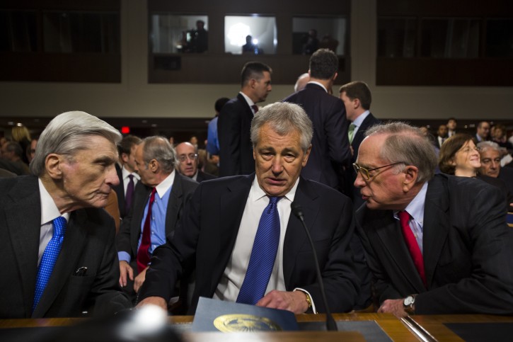 Former Republican Senator from Nebraska, Chuck Hagel (C) flanked by former Senators Sam Nunn (R) and John Warner (L), prepares to testify before the Senate Armed Services Committee on his nomination for the post of Secretary of Defense in the Dirksen Senate Office Building on Capitol Hill in Washington, DC, USA, 31 January 2013. If confirmed, Hagel, who was wounded twice in Vietnam, will be the first enlisted man to serve as Defense Secretary.  EPA/JIM LO SCALZO