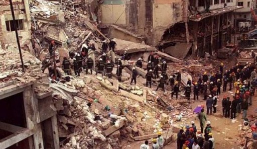 This file photo shows rescue workers searching through the rubble of the Buenos Aires Jewish Community center after a deadly bombing on July 18, 1994. (Photo Credit:AP)
