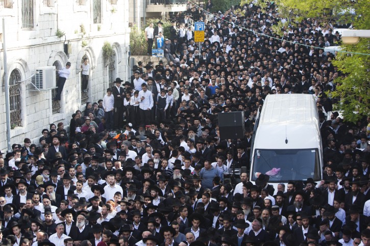 Religious Jews mourn the death of Rabbi Yaakov Yosef, son of the spiritual leader of Israel's ultra-Orthodox Shas party Rabbi Ovadia Yosef, during the funeral in Jerusalem, April 12, 2013. Rabbi Yaakov Yosef died at the age of 66. Photo by Yonatan Sindel/Flash90