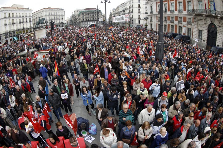 Demonstrators march during a Labor Day rally organized by Spanish two big trade-union confederations, CCOO and UGT, in Puerta del Sol square, in Madrid, central Spain, on 01 May 2013. People from around the world mark 01 May (May Day) as International Labor Day.  EPA/J. J. GUILLEN