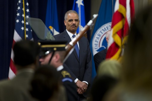 US Attorney General Eric Holder prepares to speaks at a special naturalization ceremony at the Department of Justice in Washington DC, USA, 28 May 2013. During the ceremony, 70 people took the Oath of Allegiance to become new US citizens.  EPA/JIM LO SCALZO