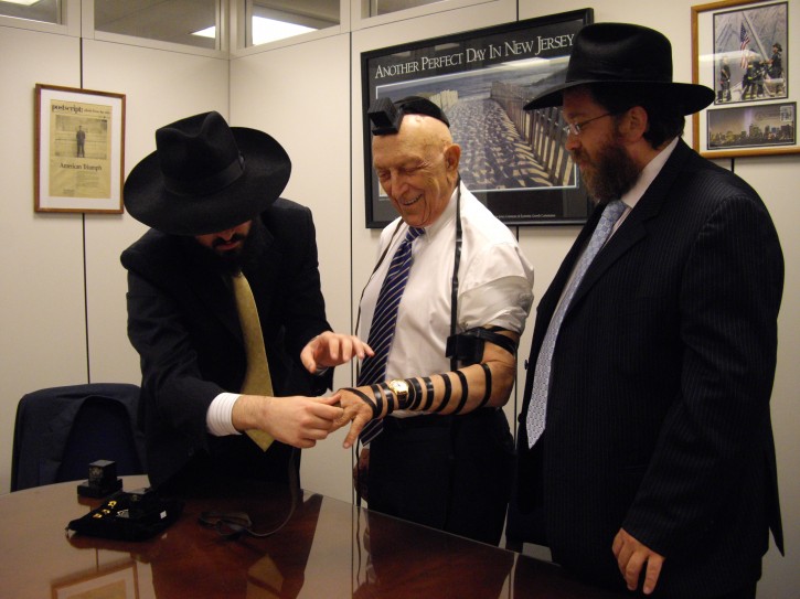 FILE PHOTO June 2010 - Rabbi Levi Stone, Director of the Schneerson Center for Jewish Life- Chabad, in Westport, CT  together with recently deceased United States Senior Senator Frank Lautenberg of New Jersey and Rabbi Mendy Carlebach of Chabad Lubavitch at Rutgers University put on Tefillin (ritual prayer boxes) with the Senator at his office in Washington, D.C. 