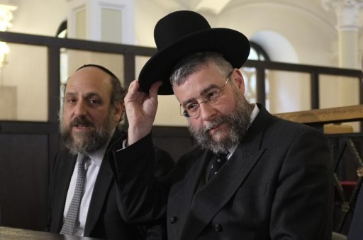 FILE - Rabbi Pinchas Goldschmidt (R), Chief Rabbi of Moscow, and Rabbi Michael Schudrich, Chief Rabbi of Poland, arrive for a news conference at The Conference of European Rabbis at a Synagogue in Warsaw November 1, 2011. REUTERS/Peter Andrews 